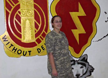 U.S. Army Specialist Amanda Tyson and Service K9 Barrett